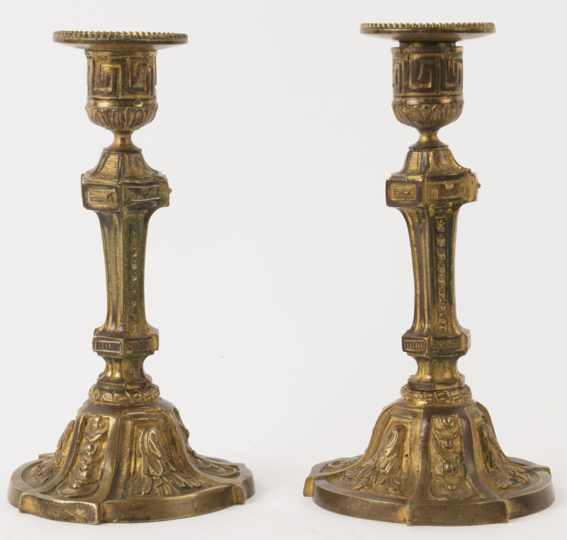 A pair of antique French ormolu candlesticks, 19th century, 20cm high