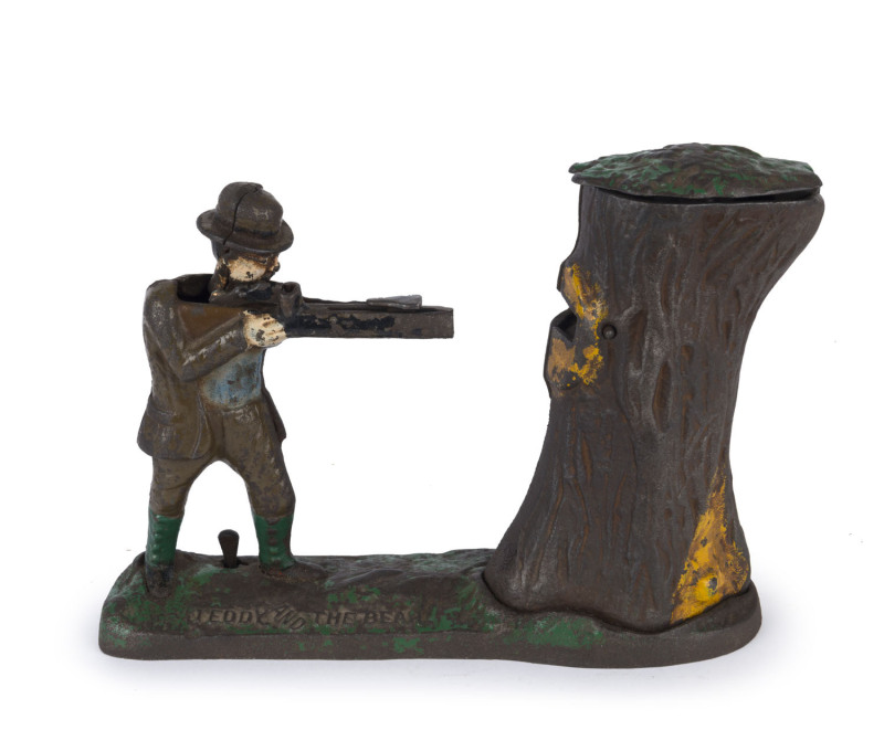 "TEDDY AND THE BEAR", American cast iron novelty money bank, late 19th century, 19cm high,