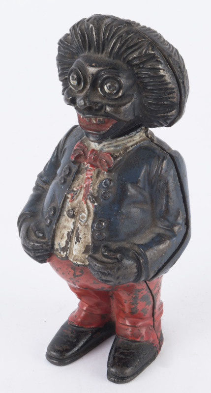 An American painted cast iron standing "Golly Wog" money bank, late 19th century, ​16cm high,