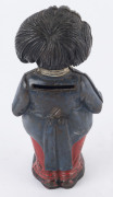 An American painted cast iron standing "Golly Wog" money bank, late 19th century, ​16cm high, - 2