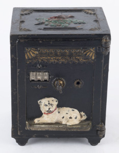 An American painted cast iron money bank safe with three combination lock, decorated with gilt Minerva head masks to the sides and reclining dog to the front door, early 20th century, 15cm high, 11.5 cm wide, 10cm deep,