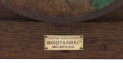 An English Arts & Crafts oak and marquetry tabletop revolving bookstand, with retailer's ivoreen plaque "BUCKLEY & NUNN Ltd. MELBOURNE", circa 1900, 33cm high, 39cm wide, 39cm deep - 2