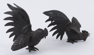 A pair of cockerel statues, patinated cast metal, late 20th century, 17cm high