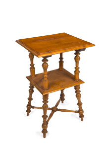 An antique English two tier occasional table, beech and pine with turned legs and columns on cross stretcher base, early 20th century, 76cm high, 48cm wide, 42cm deep