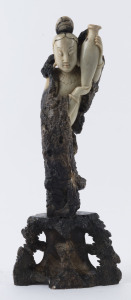 A Chinese soapstone Guanyin statue of female form, 19th/20th century. 39cm high.