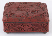 A Chinese cinnabar lacquer box, early 20th century Decorated to the hinged lid with a scrolling dragon, and floral motifs to the sides. Cinnabar on cast brass ground with internal blue enamel finish. 5.5cm high, 11cm wide, 8cm deep. - 3