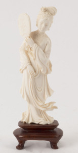 A Japanese carved ivory statue of a lady, early to mid 20th century, ​15.5cm high overall