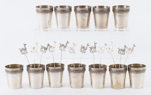 Set of 12 Peruvian silver cocktail forks and set of 12 miniature beakers, 20th century, the beakers 4cm high, 220 grams total