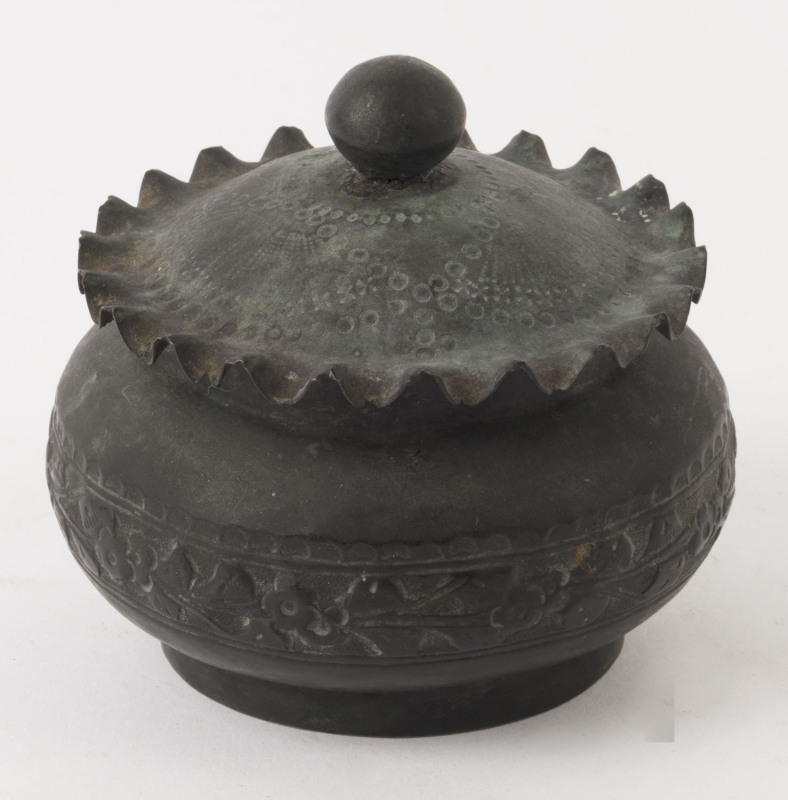 An antique Chinese silver lidded pot, 19th century, ​(very tarnished), 8cm high, 8.5cm diameter, 116 grams