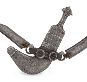 KHANJAR rare Omani dagger with belt and scabbard, 19th century. A fine piece displaying spectacular craftsmanship and silver filigree work, obviously commissioned for a noble of high rank. The Khanjar is considered a national symbol in Oman and is feature