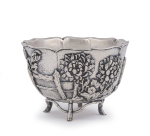 An outstanding antique Chinese silver bowl, double walled construction with superb repoussé floral decoration and stylized bamboo feet, 19th/20th century, seal mark to base, ​9cm high, 13cm wide, 312 grams