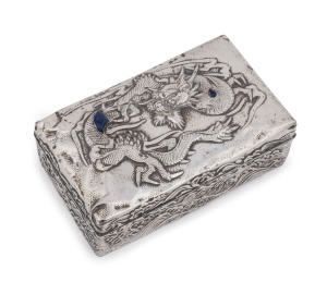 An antique Chinese silver box adorned with a dragon in seascape studded with lapis lazuli, 19th century, 5.5cm high, 15cm wide, 9cm deep