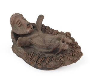 Baby Jesus in a manger, fired clay, Yuat River, Papua New Guinea, circa 1960, ​27cm long