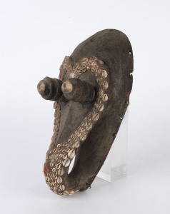 Ancestral mask, carved wood, clay and shell with remains of fibre, Sepik region, Papua New Guinea, circa 1960, ​34cm high
