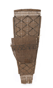 A baby carrier, woven cane and fibre, North American Indian, 19th century, 63cm high PROVENANCE: The Black Museum Collection.