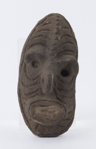 A head ornament, fired clay, Yuat River, Papua New Guinea, mid 20th century, ​22cm high