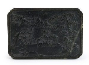 A Chinese carved spinach jade plaque with deer in landscape, Qing Dynasty, 19th century, 13.5cm high, 19.5cm wide