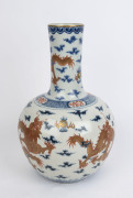An antique Chinese porcelain vase decorated with five iron red and gold celestial dragons on underglaze blue and white ground, Guangxu period, Qing Dynasty, late 19th century early 20th century, Qianlong underglaze blue six character mark to base, 38cm hi - 2