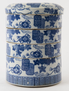 A Chinese underglaze blue and white porcelain four sectional food container, Qing Dynasty, 19th century, 24cm high.