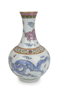 An impressive Chinese porcelain vase with three celestial dragons decorated with polychrome enamel, Republic period, 20th century, underglaze seal mark to base, 39cm high