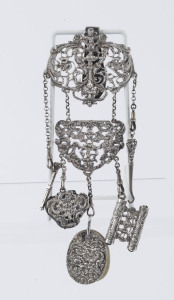 An antique sterling silver chatelaine, London, circa 1891, 23cm high