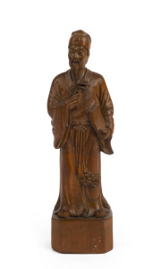 Beijing school boxwood carving of a scholar, 19th/20th century, 20.5cm high