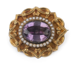 A fine antique yellow gold brooch set with large amethyst surrounded by seed pearls, mid 19th century, 4.5cm wide