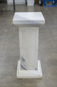 An antique white marble pedestal, 20th century, 70cm high, 30cm wide, 30cm deep