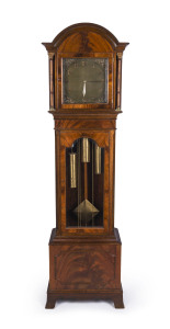 Georgian style longcase clock with three train chime and strike movement striking the hours and quarters on rod gongs, one piece brass dial housed in fine mahogany case with bevelled glass doors, early 20th century, 199cm high, 53cm wide, 59cm deep
