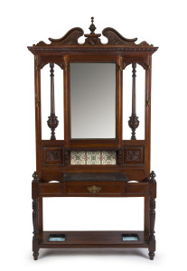 An antique English walnut hallstand with tile back and black marble top, late 19th century, 227cm high, 126cm wide, 32cm deep