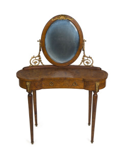 A French kidney shaped dressing table, burr elm with kingwood inlay and gilt metal mounts, circa 1930, 135cm high, 98cm wide, 50cm deep