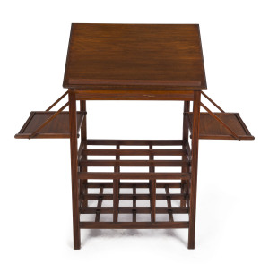 An antique English walnut Canterbury with adjustable reading slope and unusual folding sides, late 19th century, 75cm high, 54cm wide, 37cm deep