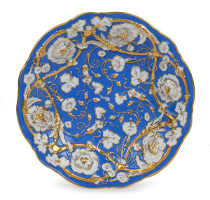 MEISSEN German porcelain cabinet plate, embossed motif on blue ground with gilt highlights, 19th century, blue underglaze cross swords mark, 21cm diameter