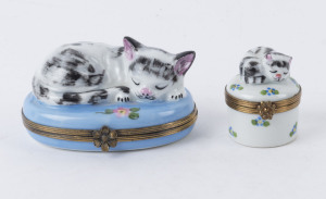 LIMOGES enamel trinket boxes with sleeping cat decoration, 20th century, (2 items) the larger 8.5cm wide