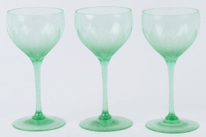 Three fine Art Nouveau green stem glasses with acid etched leaf decoration, circa 1900, 14cm high