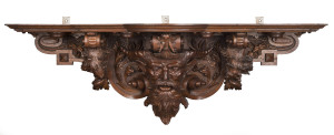 A stunning Continental oak architectural bracket carved with PAN (ancient Greek God) figure in scrolling foliate design, 19th century, 52cm deep, 145cm wide, 40cm deep