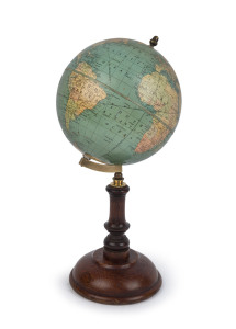 An antique American 7 inch standard globe on turned oak stand by REPLOGLE GLOBES of Chicago, 38cm high