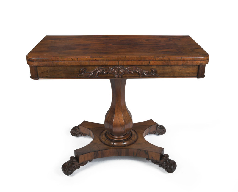 A William IV English rosewood fold-over card table, circa 1835, with furniture manufacturer's label "Martin's Furniture Warehouse.... Brighton..." 74cm high, 91cm wide, 45cm (extends to 90cm) deep