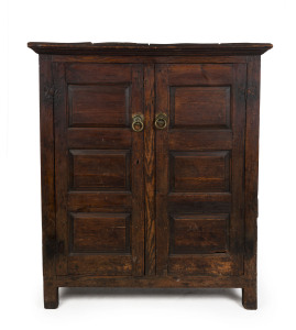 An antique English pine and oak two door cabinet with fielded panel doors and sides, peg joint construction, early 18th century, 142cm high, 119cm wide, 53cm deep