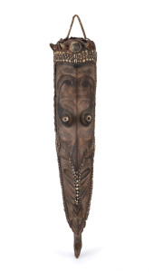 Mwai mask, carved wood, tusk, shell, hair and fibre with earth pigments, Korongo Village, Middle Sepik, Papua New Guinea, ​92cm high