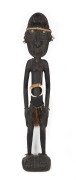 A female ancestral figure, carved wood, feather, fibre and shell with earth pigments, Mindimbit Village, Sepik region, Papua New Guinea, ​125cm high