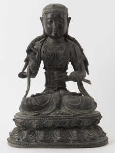 A Tibetan bronze seated Amitayus statue on a double lotus base, holding a cup in his left hand and a lotus in his right, Kangxi period, Qing Dynasty, early 18th century, six character Tang style mark to back, 38cm high
