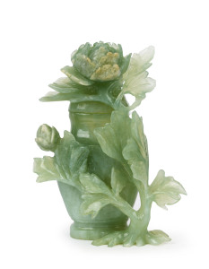 A Chinese carved jade lidded jar decorated with peony flowers and foliage, 19th/20th century, ​14.5cm high
