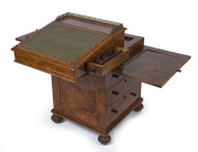 GILLOWS antique English burr walnut Davenport, handsomely fitted with pull-front writing slope, stationary drawer, ink and pen drawer and book rest slide. Original Bramah locks and keys with Gillows' signature melon feet with sunken casters. Stamped "GILL - 2