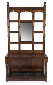 GILLOWS & Co. MANUFACTURERS LANCASTER fine antique walnut hallstand with brass and horn hooks and bevelled mirror, late 19th century, stamped with design number "L7931" underneath front rail and "Gillow & Co. Lancaster" on each side rail. Originally a shop fixture at the Gillows store in Oxford Street, London. 204cm high, 109cm wide, 44cm deep.