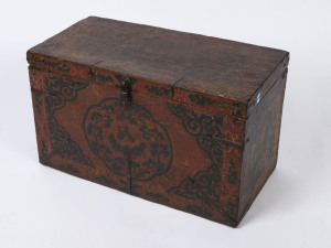 A Chinese lift-top trunk, leather bound with iron fittings and red painted lacquer finish, early to mid 20th century, 41cm high, 69cm wide, 35cm deep