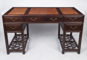 A Chinese rosewood twin pedestal desk with inlaid amboyna panels, 20th century, 84cm high, 150cm wide, 70cm deep