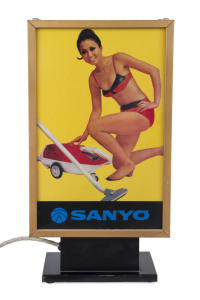 SANYO - ADVERTISING: vintage illuminating counter top sign, promoting portable miniature TV on one side and vacuum cleaner on the other; 47cm high, 25cm wide, 11cm deep, c.1970s.