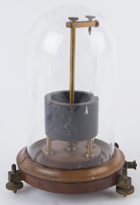 An antique English gas/arc display in glass dome on mahogany base, late 19th century, ​26cm high