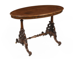 An antique oval occasional table, carved walnut and pine, 19th century, 70cm high, 108cm wide, 60cm deep